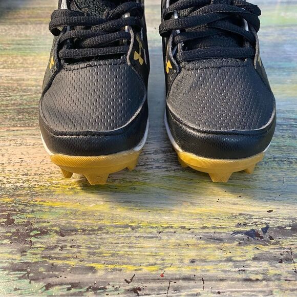 Under Armour Black and Gold Cleats with Sporty Design - Picture 2 of 8